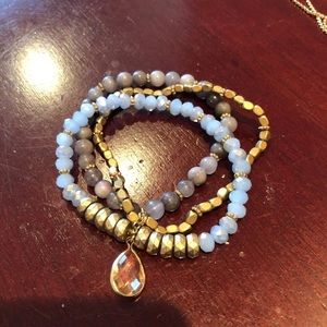 Light blue and gold bracelet with teardrop jem